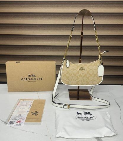 Coach teri shoulder bag in signature canvas bag with box
