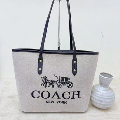 Coach voyager jet set print tote bag with dust bag