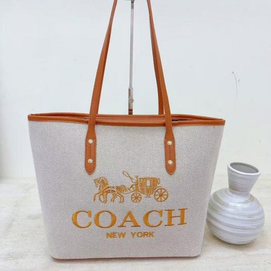 Coach voyager jet set print tote bag with dust bag